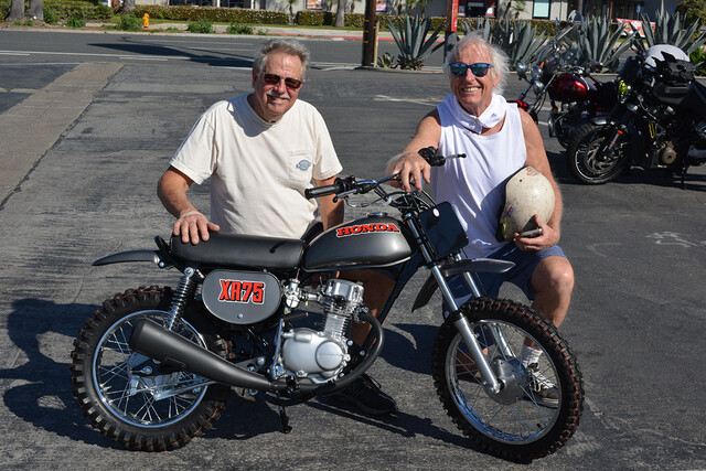 Doug Rickertsen of Huntington Beach with his 1973 Honda XR75 and Patt Hawley who painted the bike