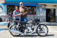 Debbie Hopkins presenting Larry Horn with the trophy and his 1955 Velocette MSS